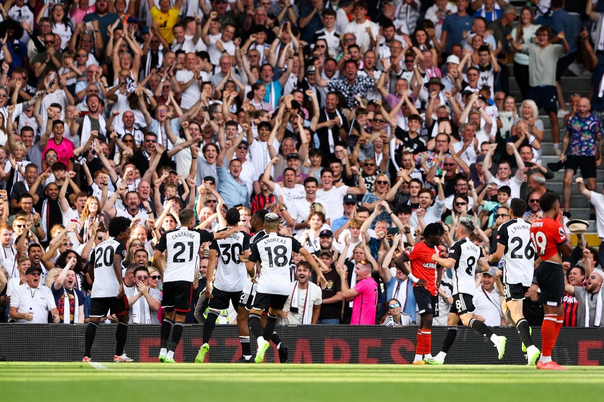 How to buy Fulham tickets: Prices, membership, essential guide to cheap Premier League tickets 2025/26 1 Fulham players celebrating with the club's supporters at Craven Cottage | How to get Fulham tickets | How to buy Fulham tickets