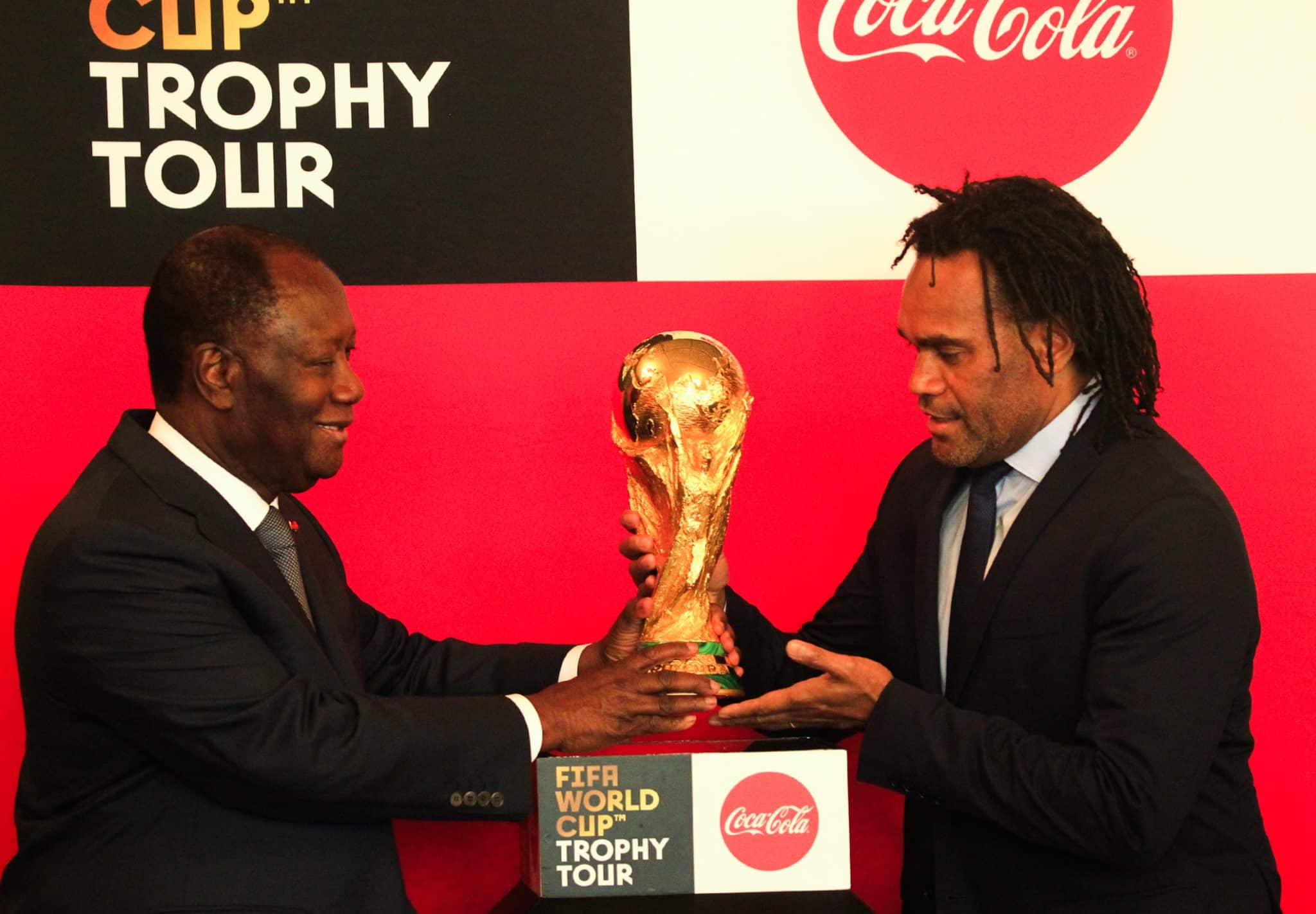 Alassane Ouattara - President of Ivory Coast, pictured here with the FIFA World Cup | The Alassane Ouattara Stadium is named after the President who has been in power since 2010