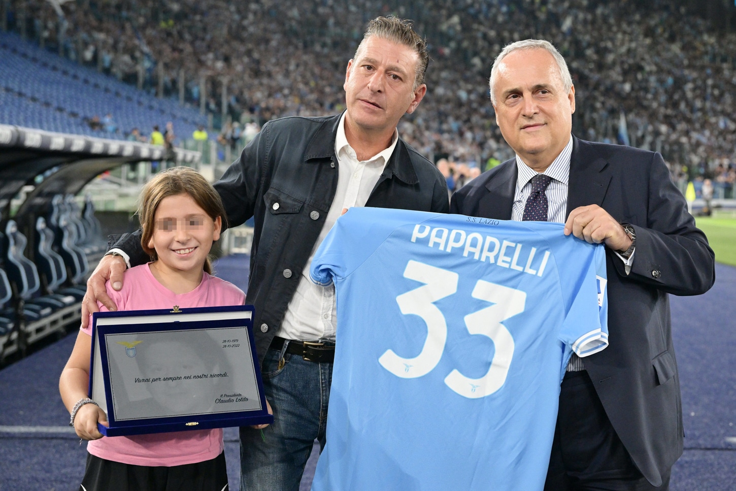 Flares, bottles and stabbings: Rome derby violence explained 4 A Lazio shirt with Vincenzo Paparelli 33 on the back