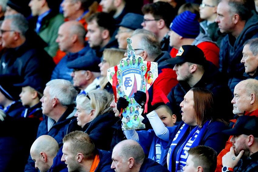 Chesterfield fans hold up replica FA Cup trophy