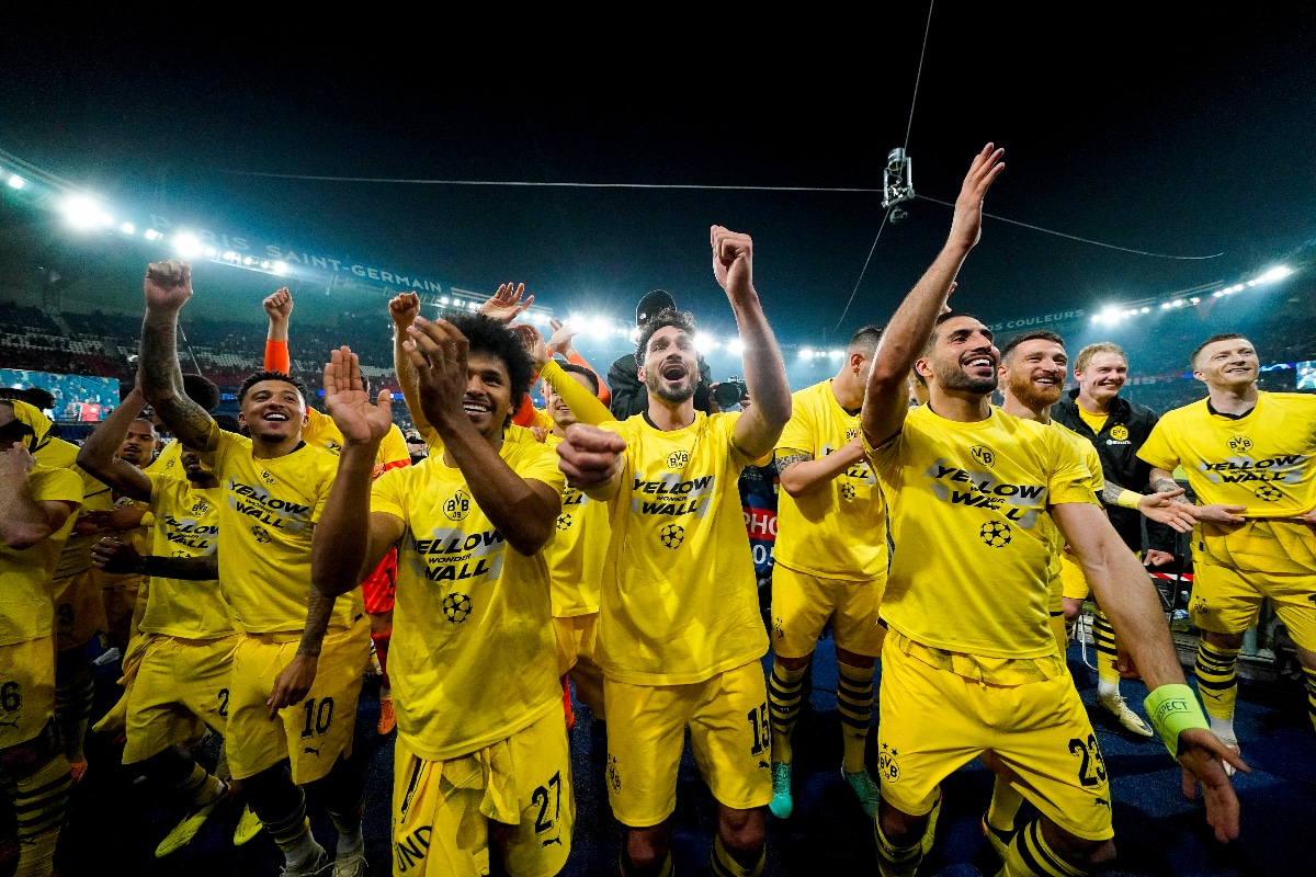 Marco Reus celebrates with Borussia Dortmund fans after semi-final victory 1 Players celebrate with Borussia Dortmund fans