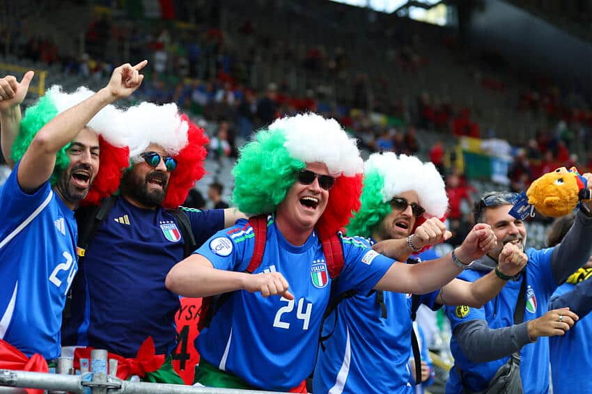Italy fans join in with Albanian dance circle