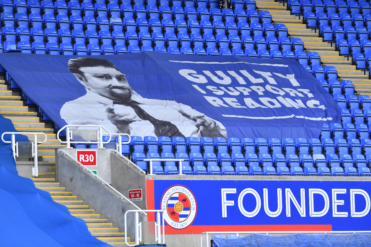 A Reading FC banner featuring Ricky Gervais as David Brent