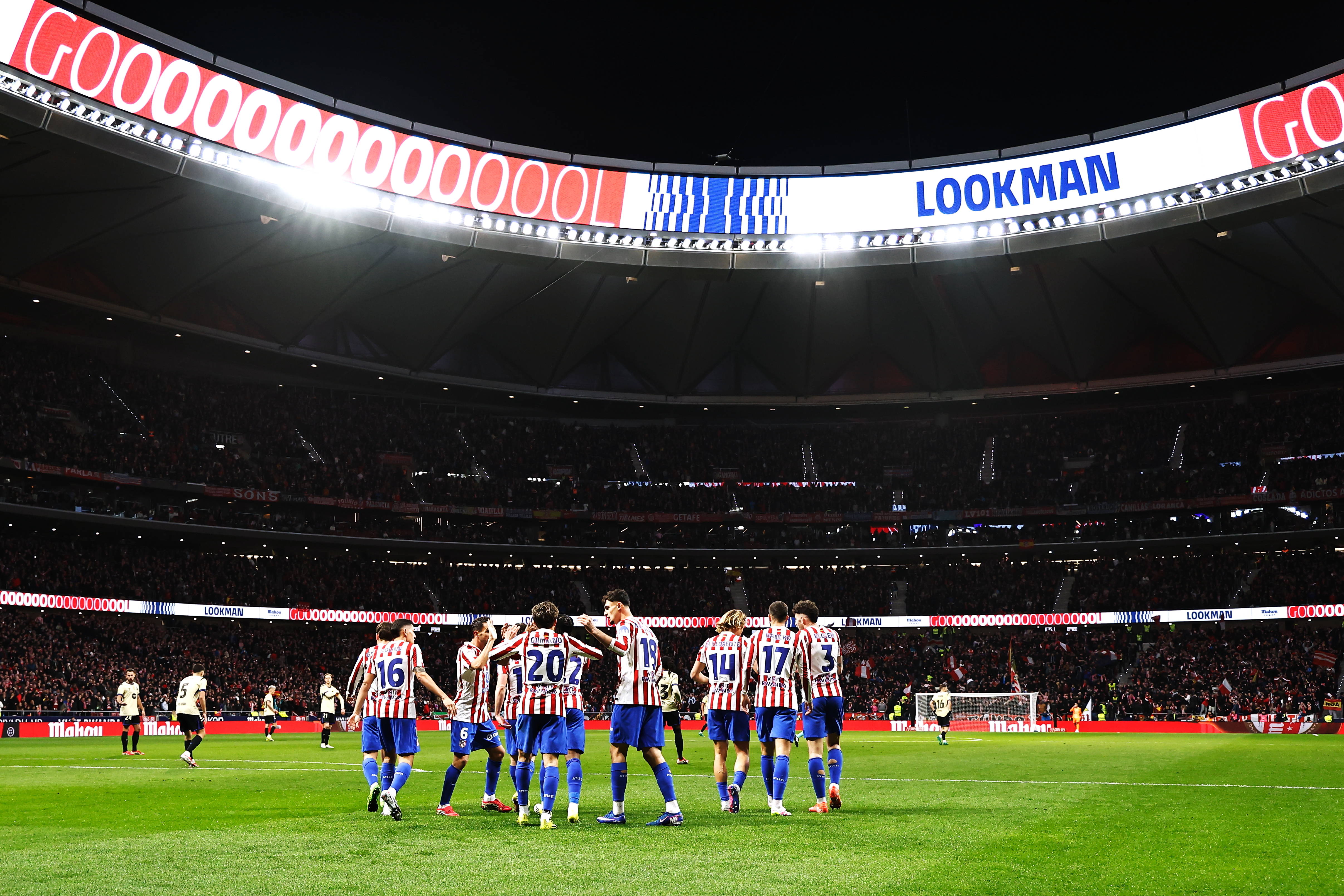 Atletico Madrid team celebrate after Barcelona own goal during Spanish Copa del Rey semi-final first leg at the Metropolitano
