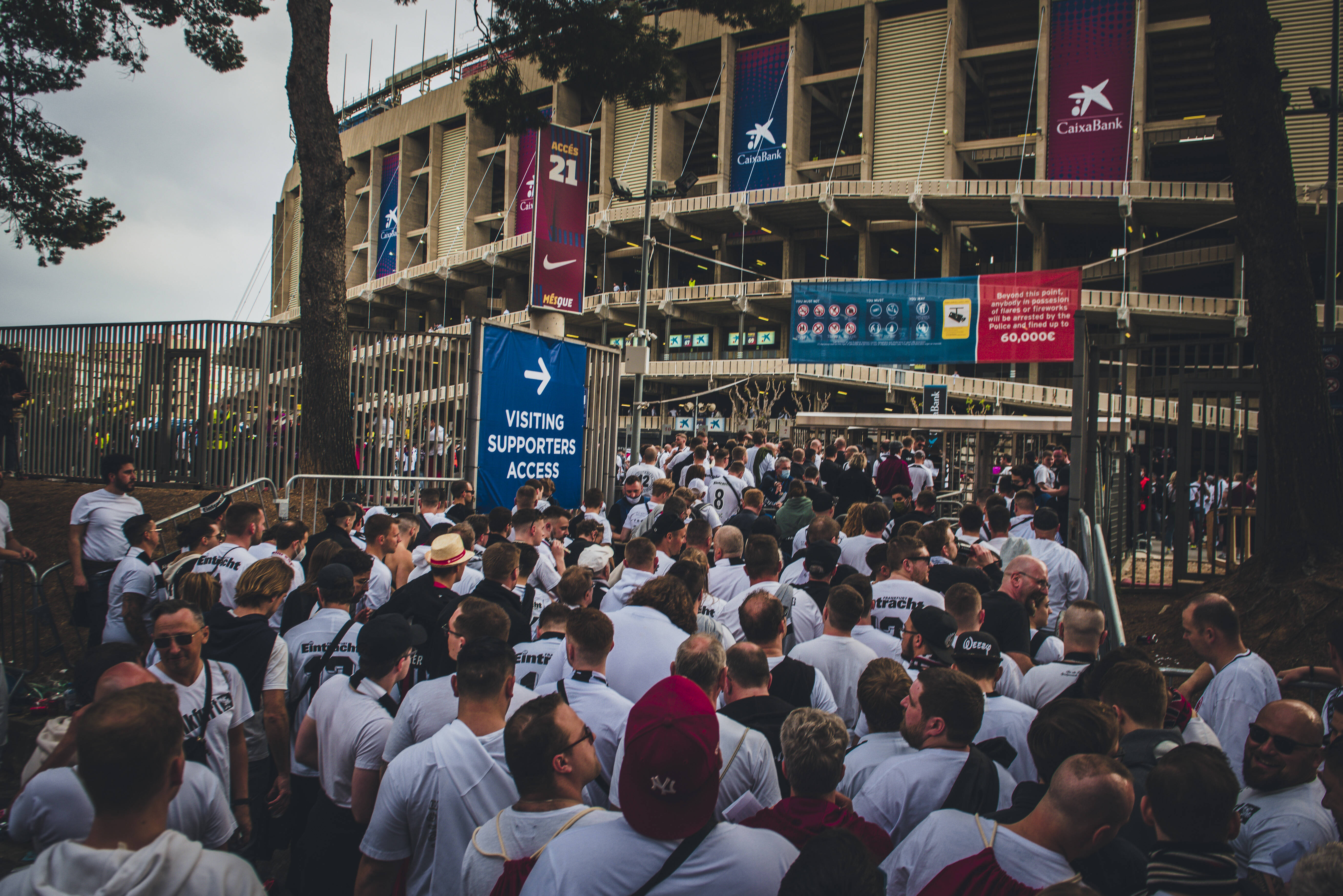 Fans of Eintracht Frankfurt queue up to enter Barcelona s Camp Nou Stadium