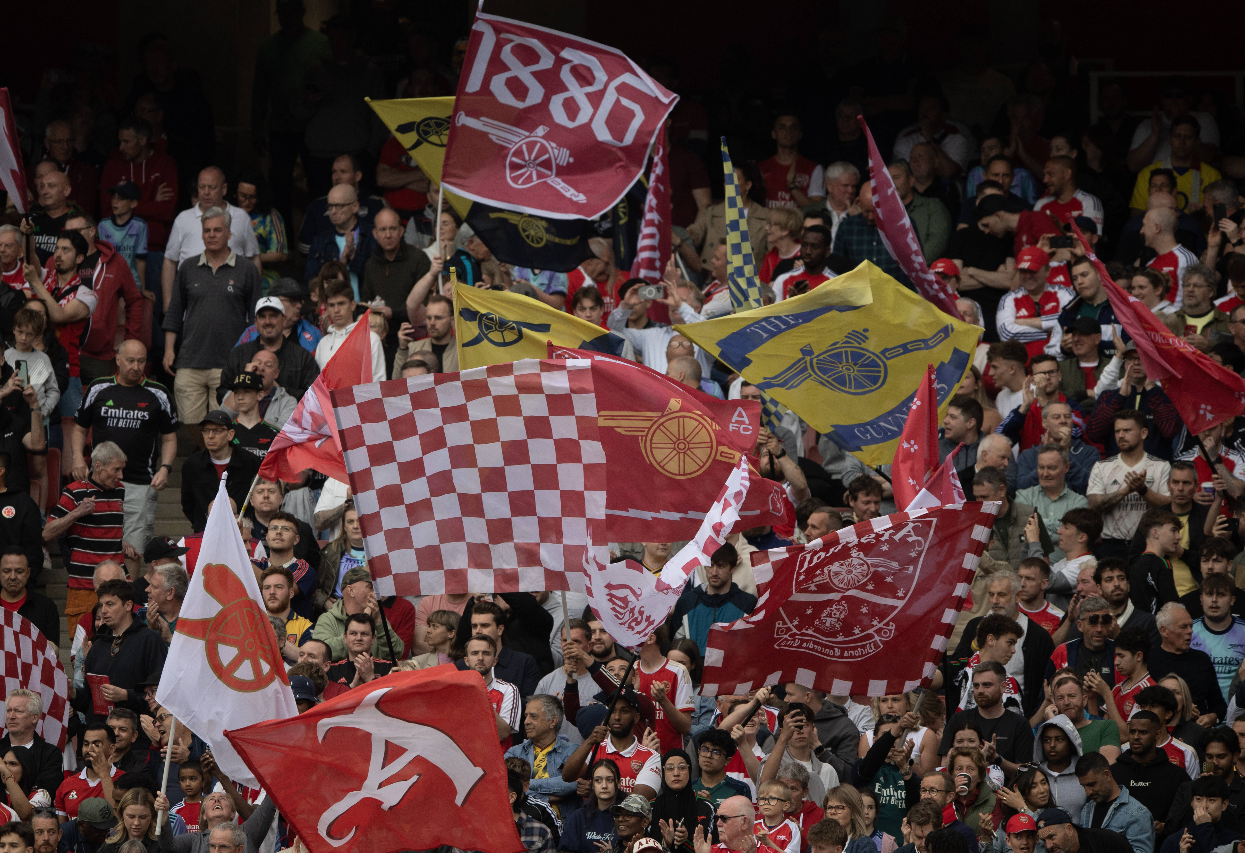 Colourful Arsenal flags and banners at the Emirates Stadium
