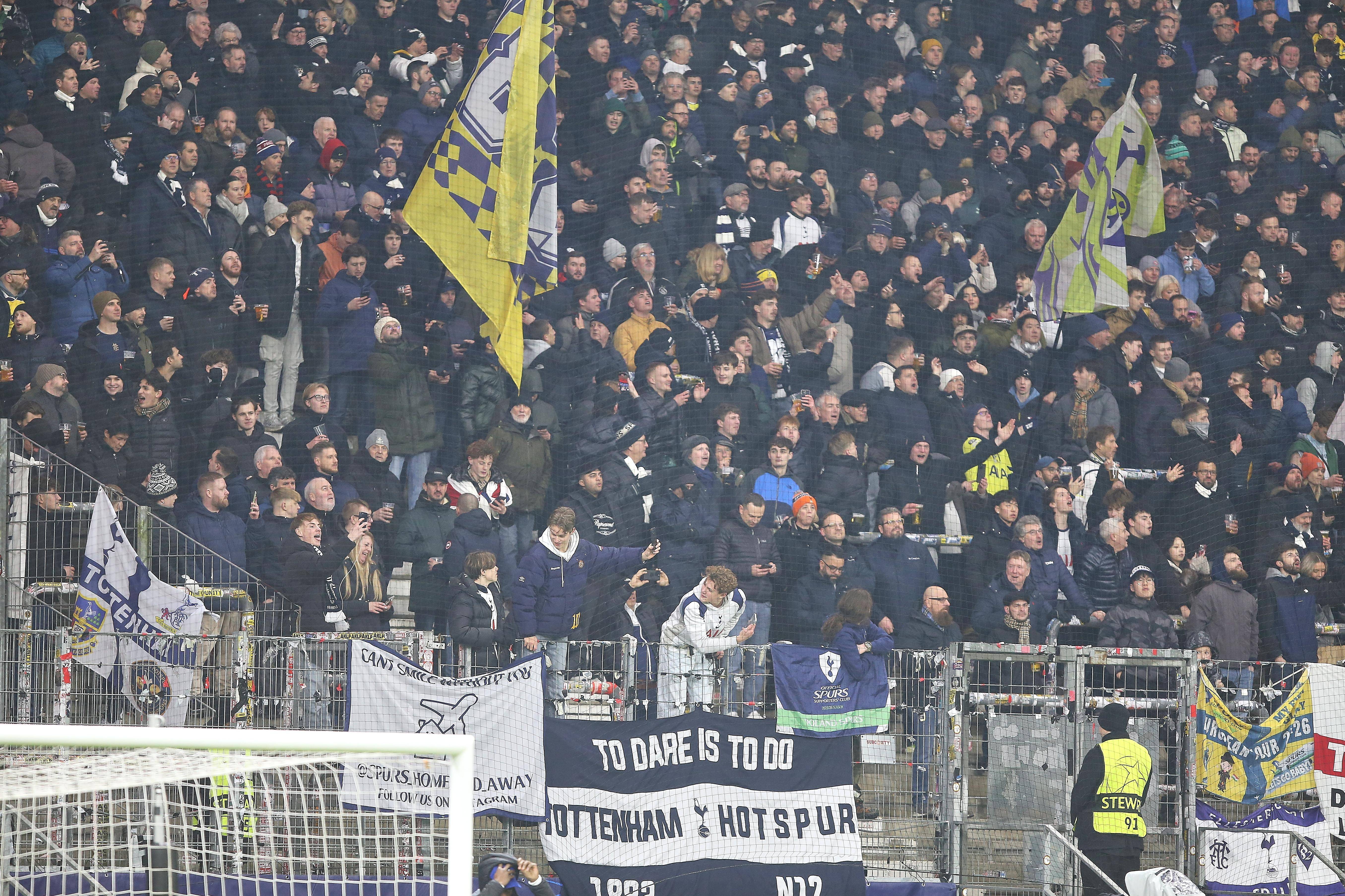 UEFA hit Tottenham Hotspur with fine and suspended ticket ban after three fans' "abhorrent" conduct 1 Tottenham Hotspur fans during Frankfurt clash