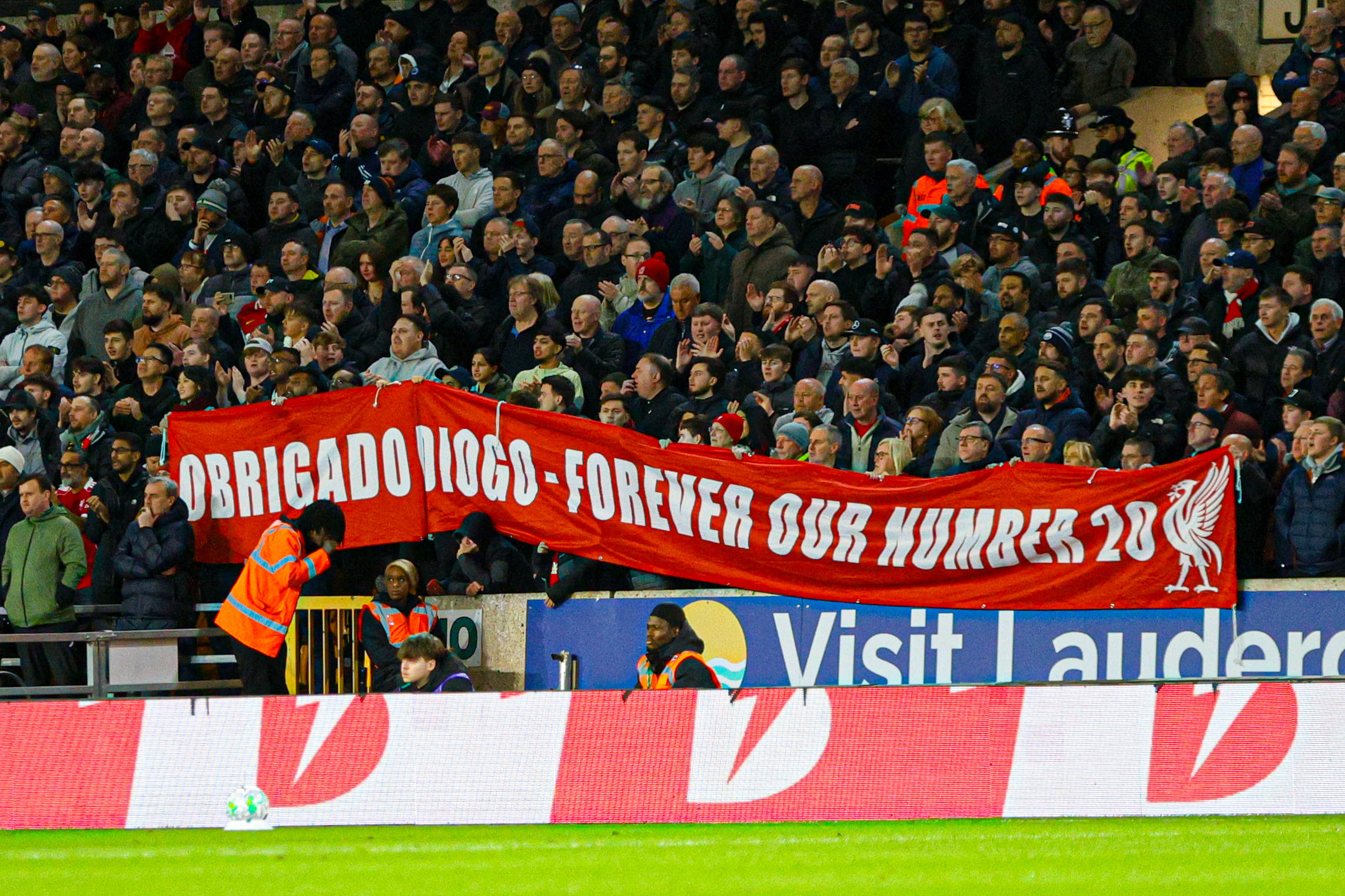 Watch as Liverpool and Wolves supporters unite with a touching tribute to Diogo Jota at Molineux