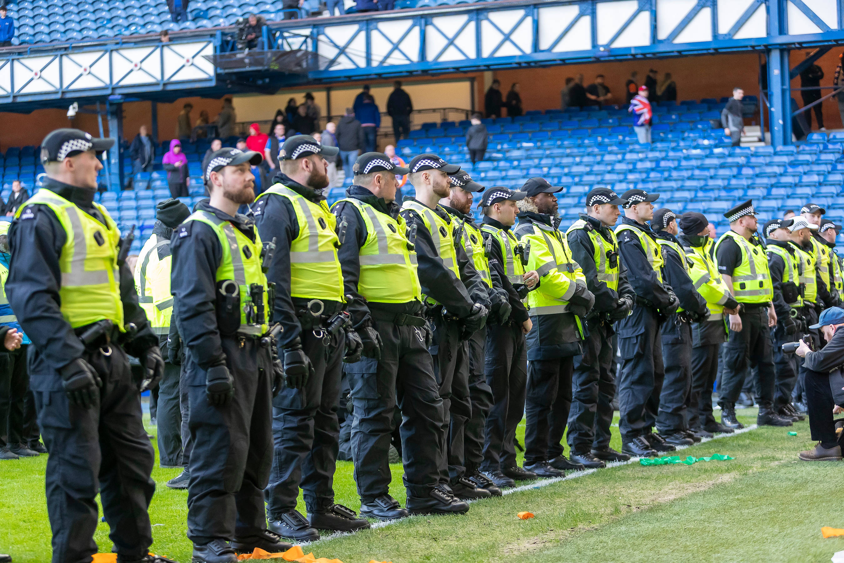 Rangers told to clamp down on ultras after city authorities meeting ahead of next Old Firm derby 1 Police line the pitch at Ibrox during the Scottish Cup quarter-final between Celtic and Rangers